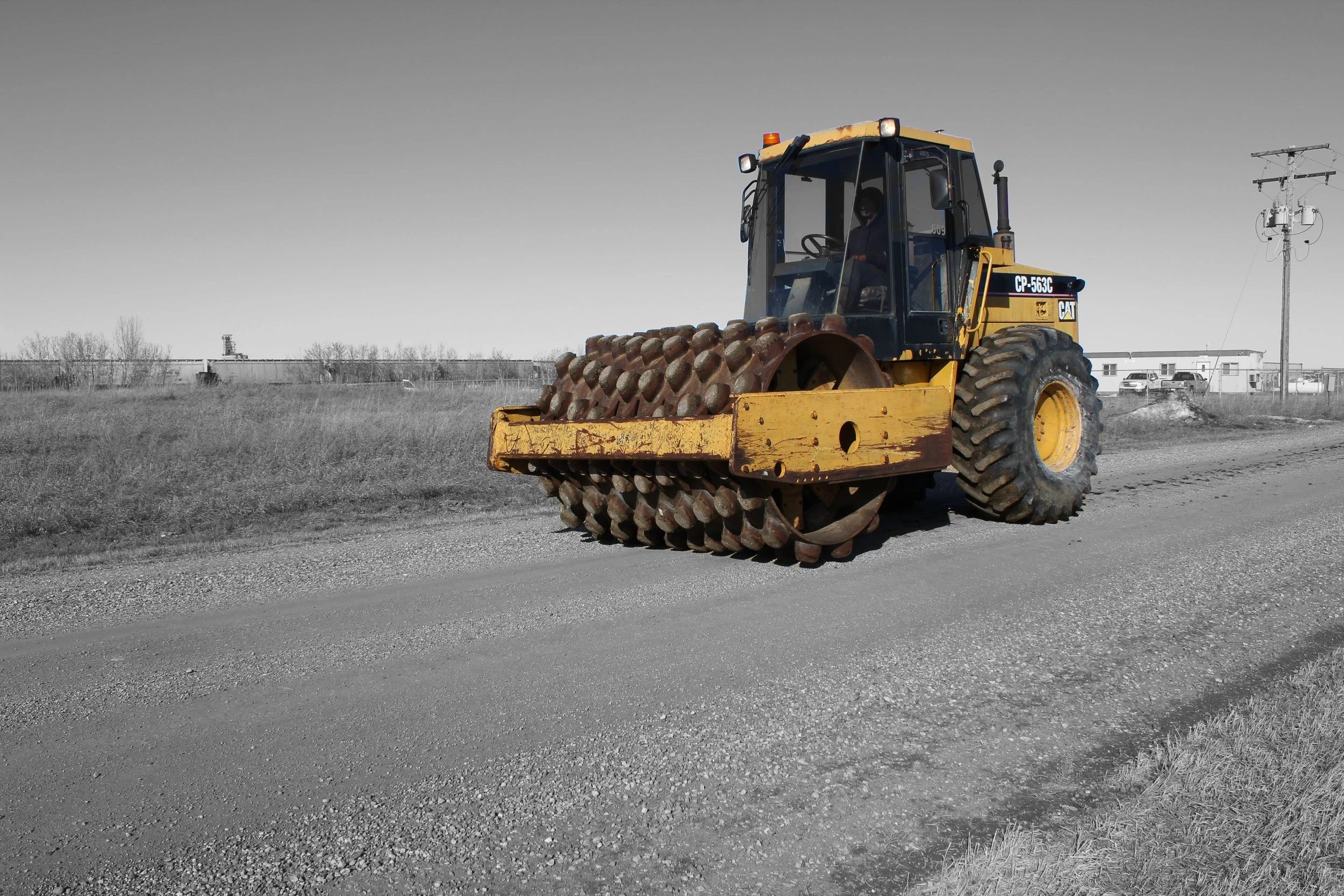 Cat 84 inch sheepsfoot vibratory packer at work